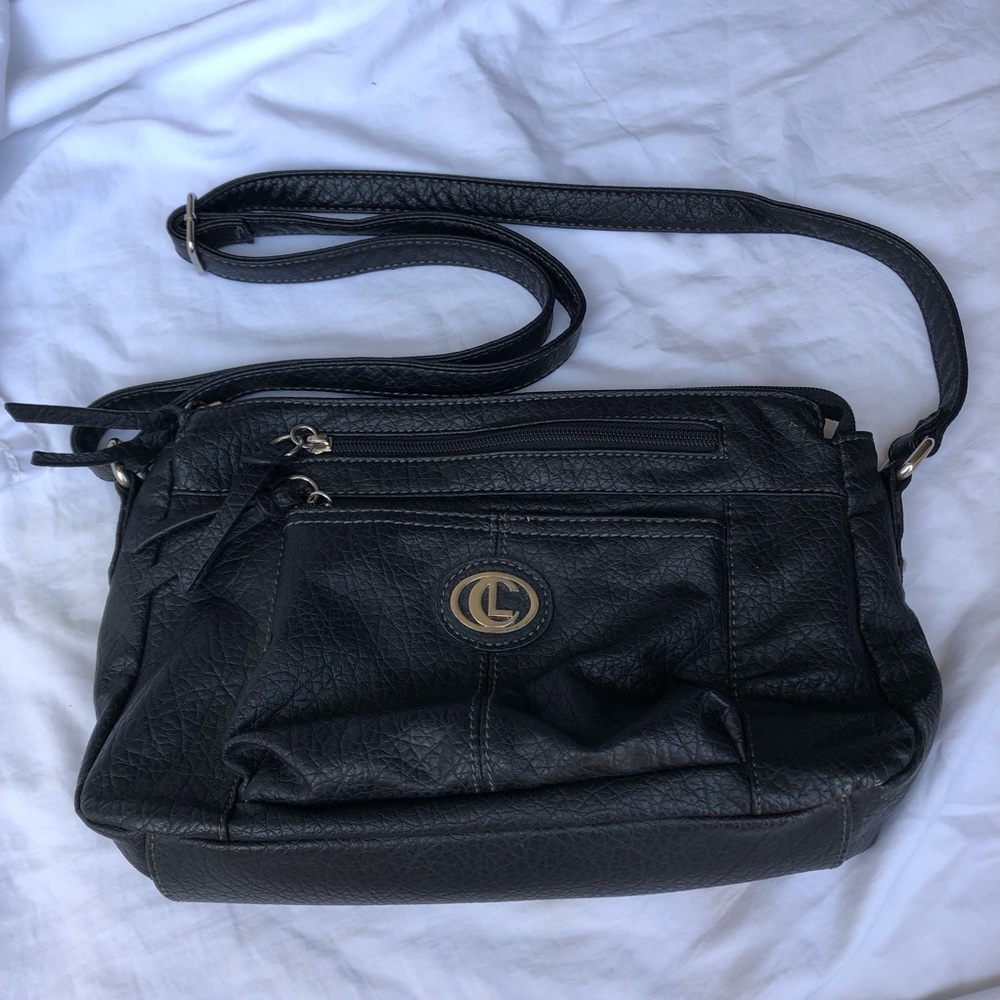 Black vegan purse with adjustable strap